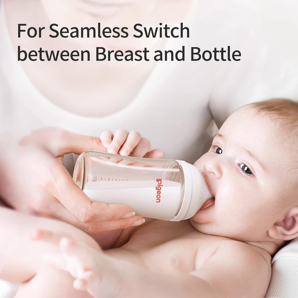 Pigeon Baby Bottle Nipple 1 Pack; white nipple on bottle feeding a baby, showing seamless switch from breast.
