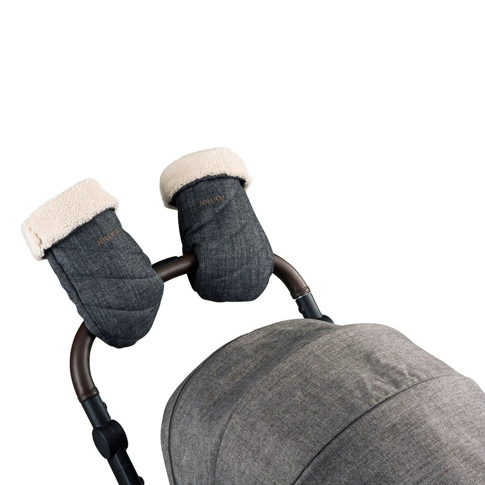 ROMER Romer Tura Winter Kit: cover and gloves on a stroller handle with cream shearling cuffs.