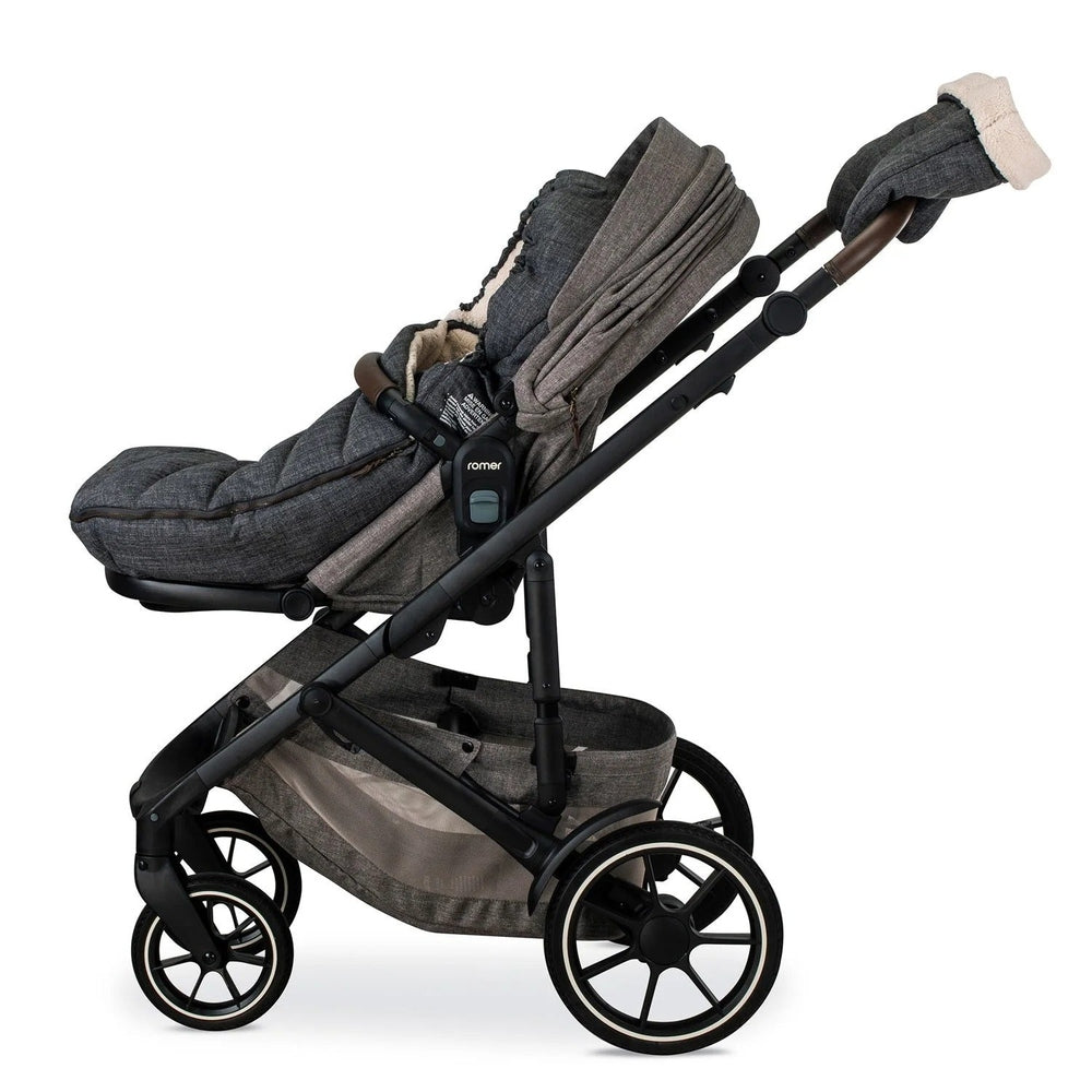 Romer Tura Winter Kit (Cover + Gloves) on a gray stroller, showing the insulated cover and attached mittens.