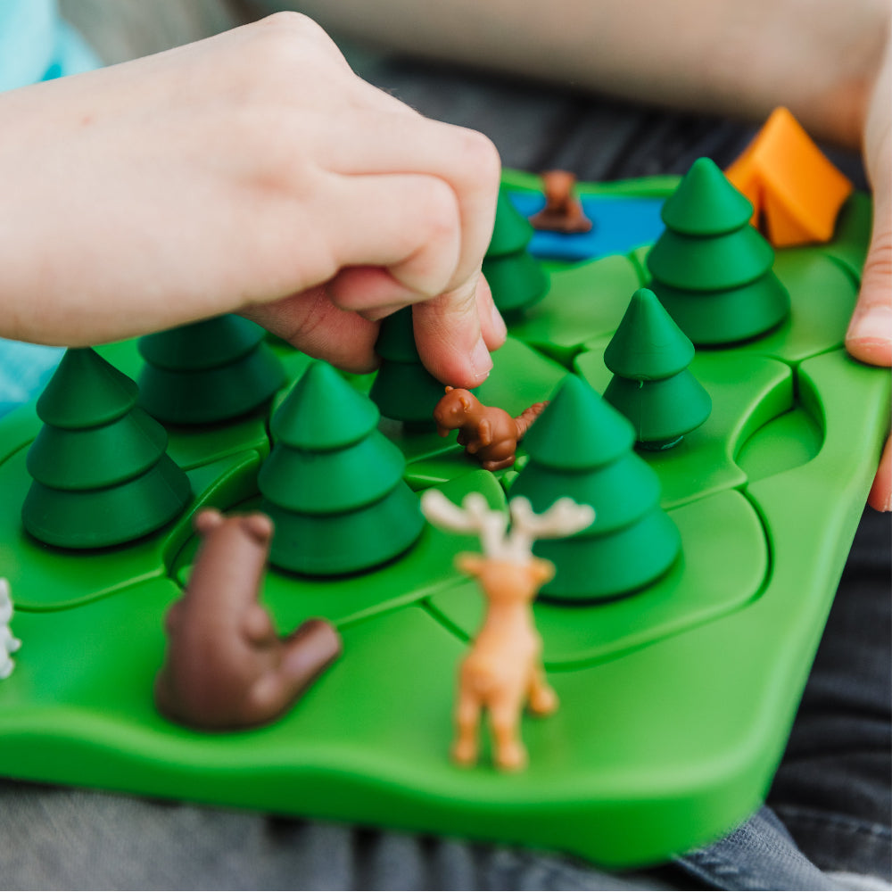 Smart Games Grizzly Gears educational toy with a green forest game board and multiple animal figurines