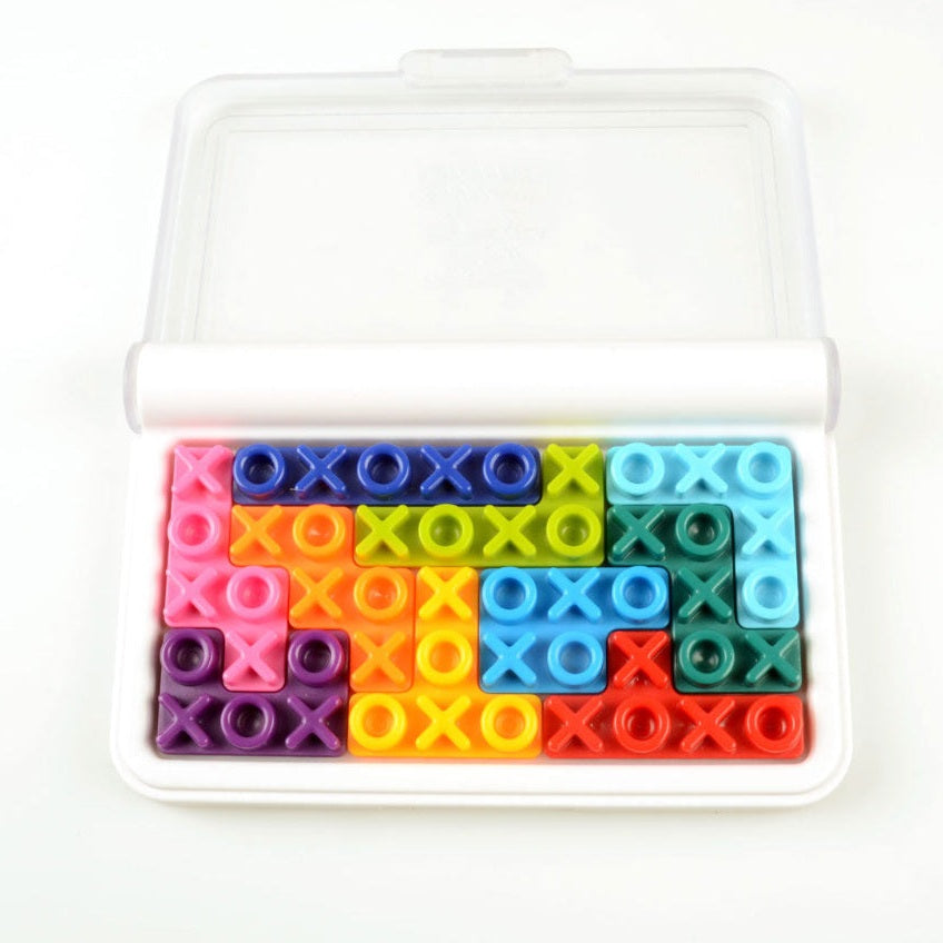 Smart Games IQ XOXO puzzle set with colorful X and O blocks in a white case