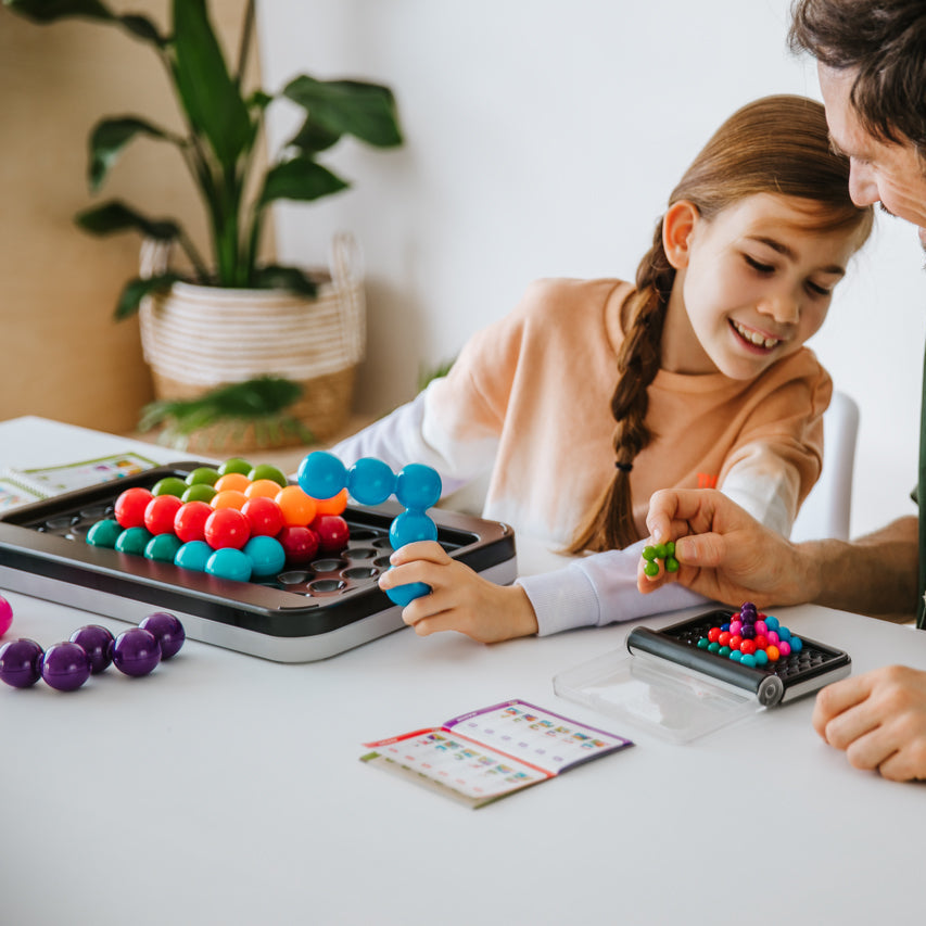 Smart Games IQ Puzzler Pro XXL puzzle game with colorful beads