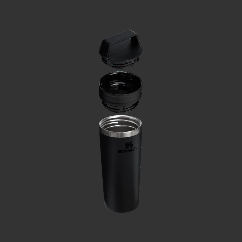 Black insulated mug with lid on a white background