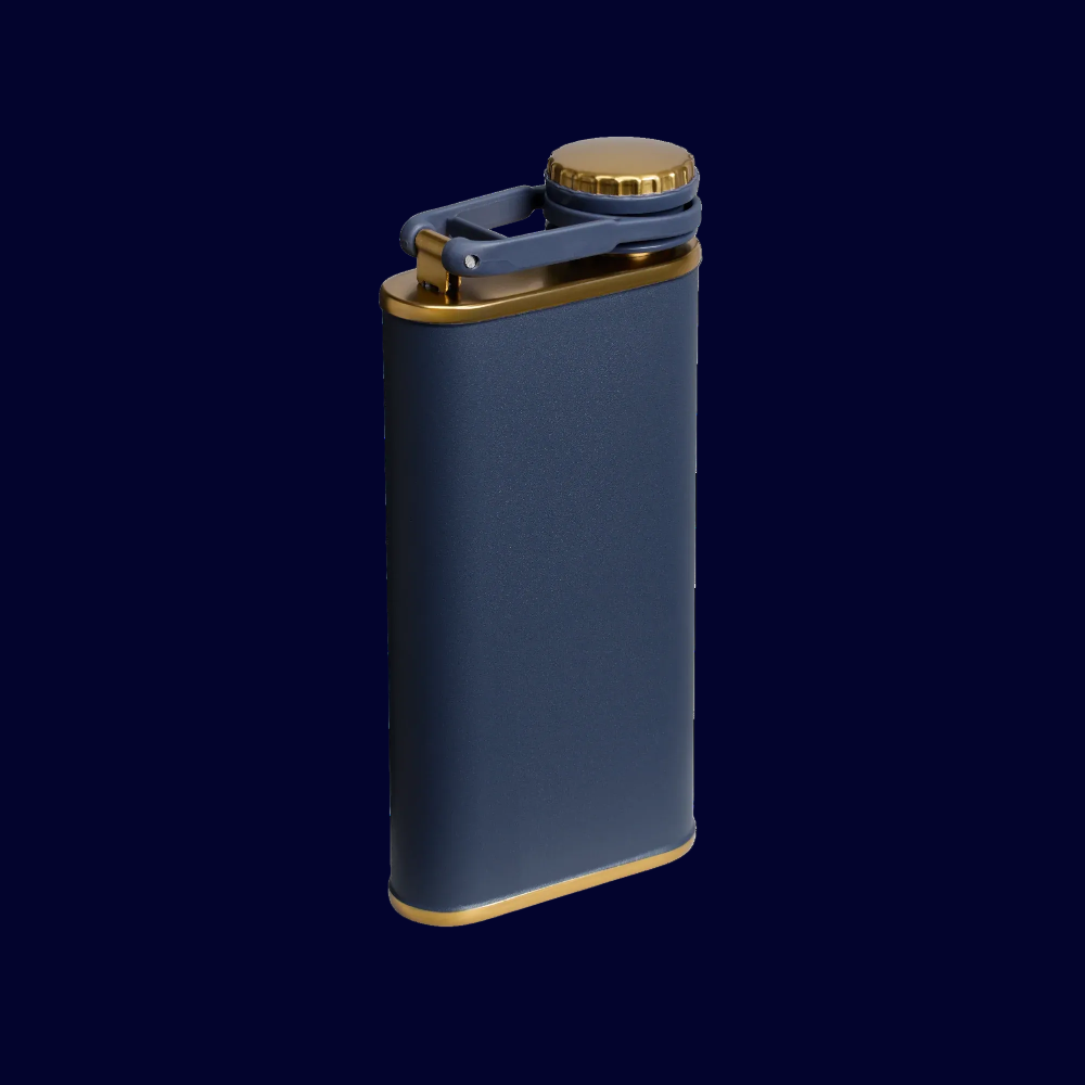 Navy blue flask with gold cap and band on a white background