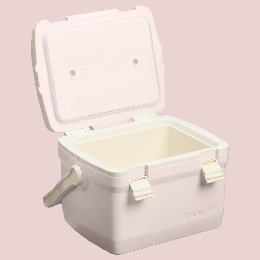 Stanley The Easy Carry Lunch Cooler 7 QT / 6.6L in pastel pink with open lid and sturdy latches.