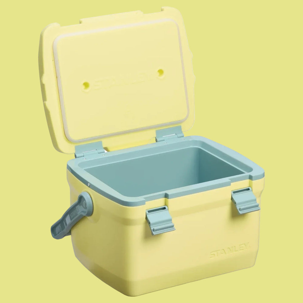 Stanley The Easy Carry Lunch Cooler 7 QT / 6.6L, yellow with pale blue lid, open lid showing roomy interior and side handles.