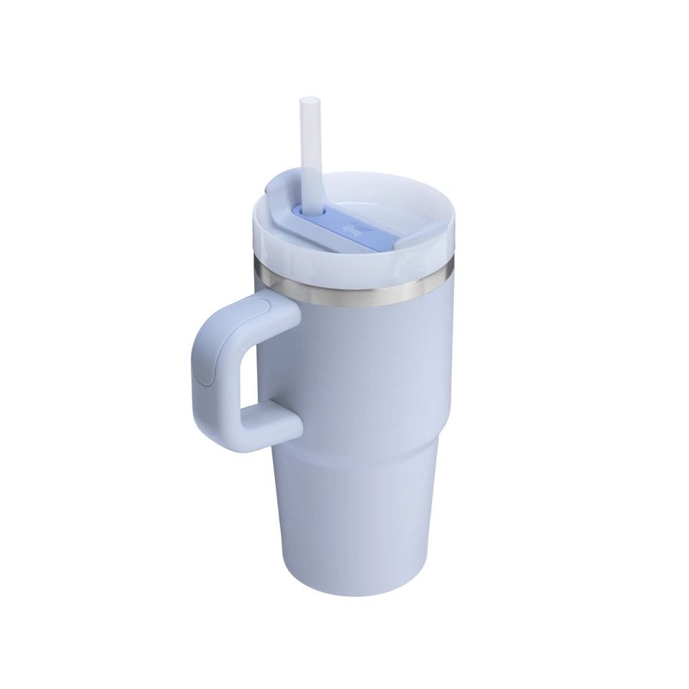Stanley The Quencher H2.0 Flowstate Tumbler With Handle 20 oz in light blue, featuring a built-in straw protruding from the lid.