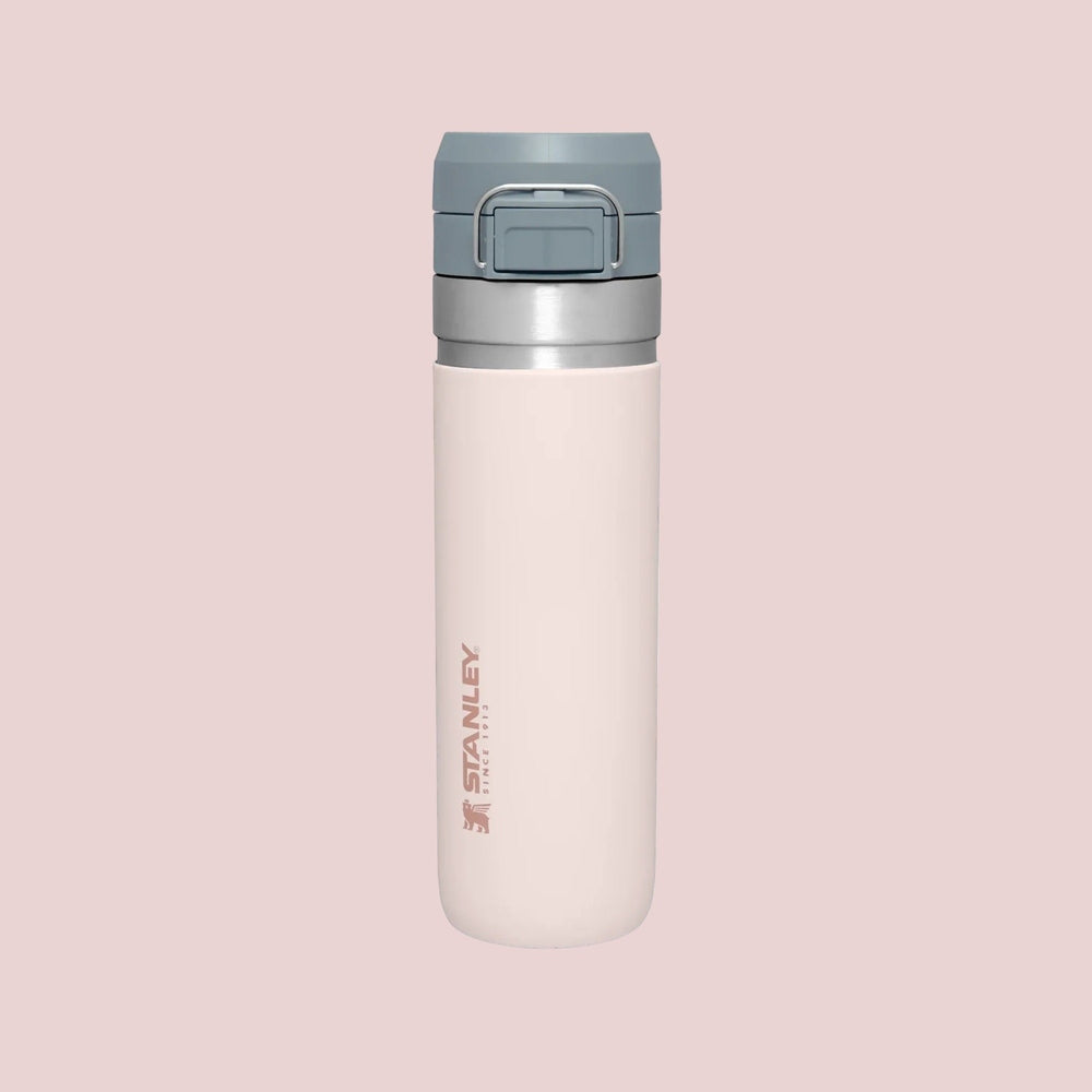 STANLEY The Quick Flip GO Bottle 24 oz pink with gray flip-top lid, standing upright.