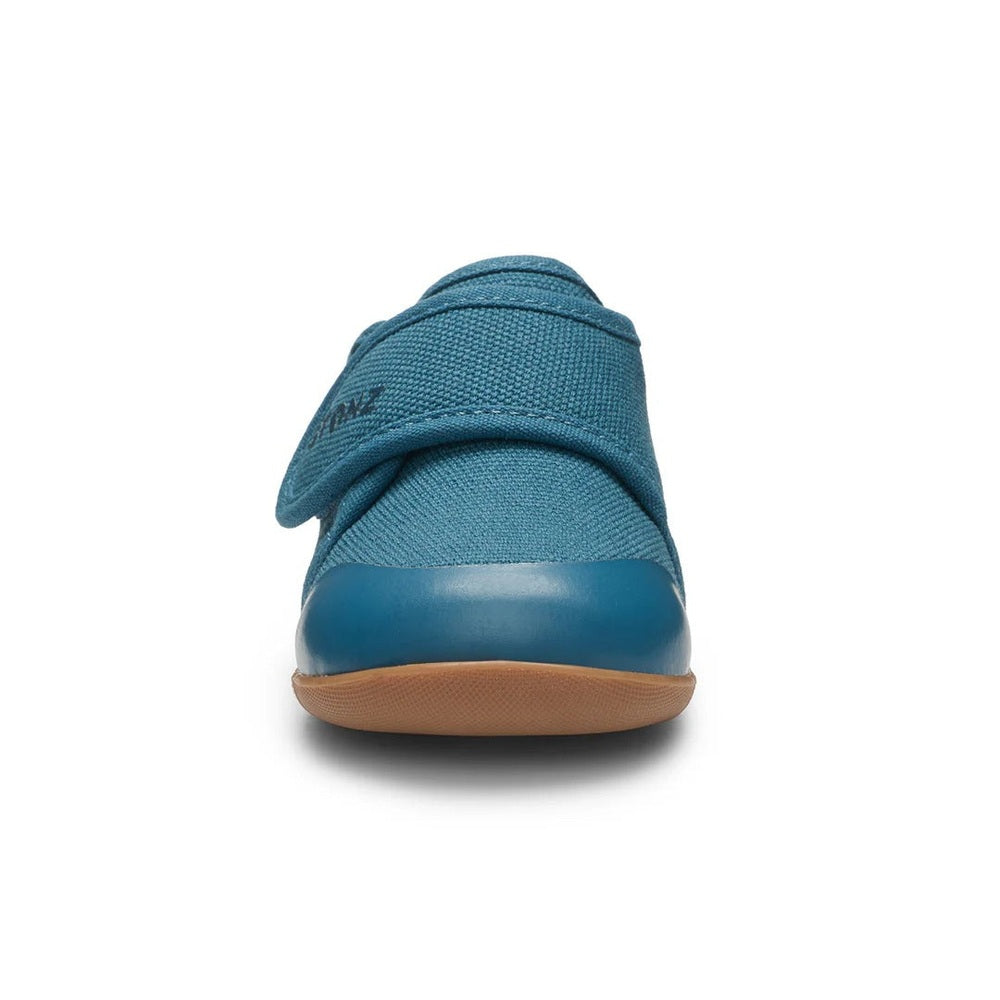 Stonz Cruiser Natural Baby Shoes Denim in blue denim with Velcro strap and rubber sole.
