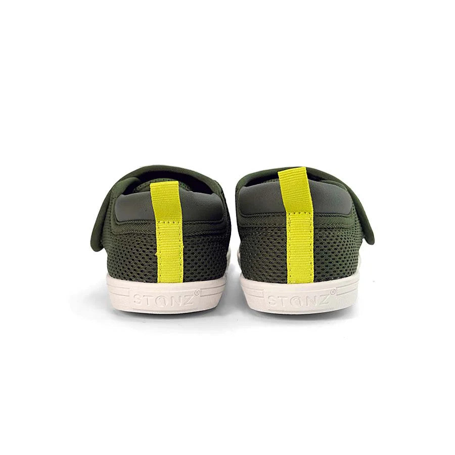 Stonz Cruiser Original Toddler Shoes Cypress, pair in olive-green mesh with bright yellow heel tabs and white soles.