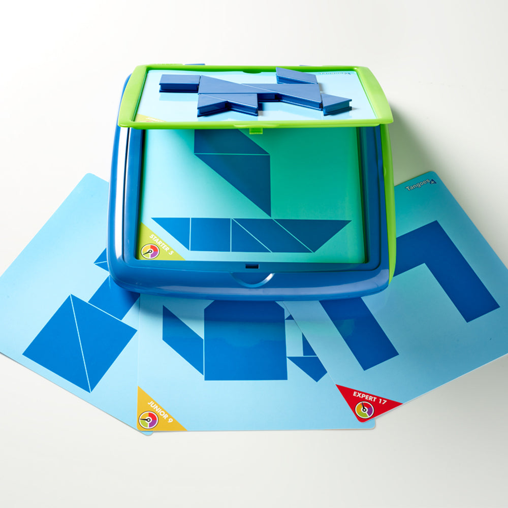 Smart Games Tangoes Jr puzzle game with blue geometric tiles and green frame