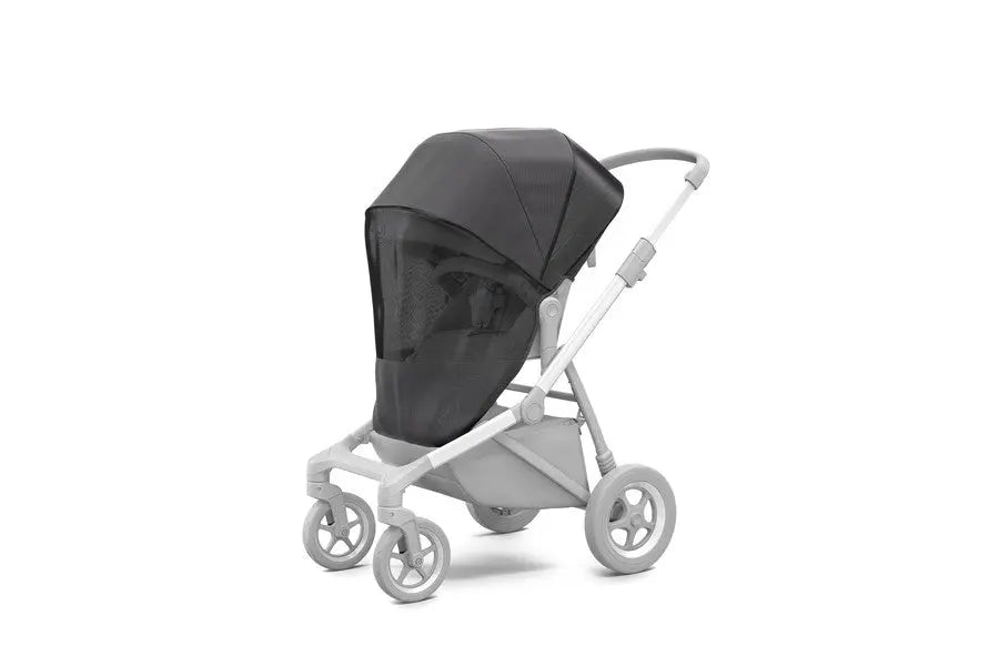 Thule Sleek Mesh Cover for stroller on a white-frame pushchair, black mesh canopy providing ventilation.