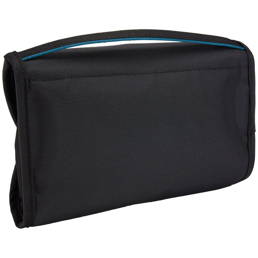 Thule Subterra toiletry bag, black fabric with blue zipper accent, compact travel pouch