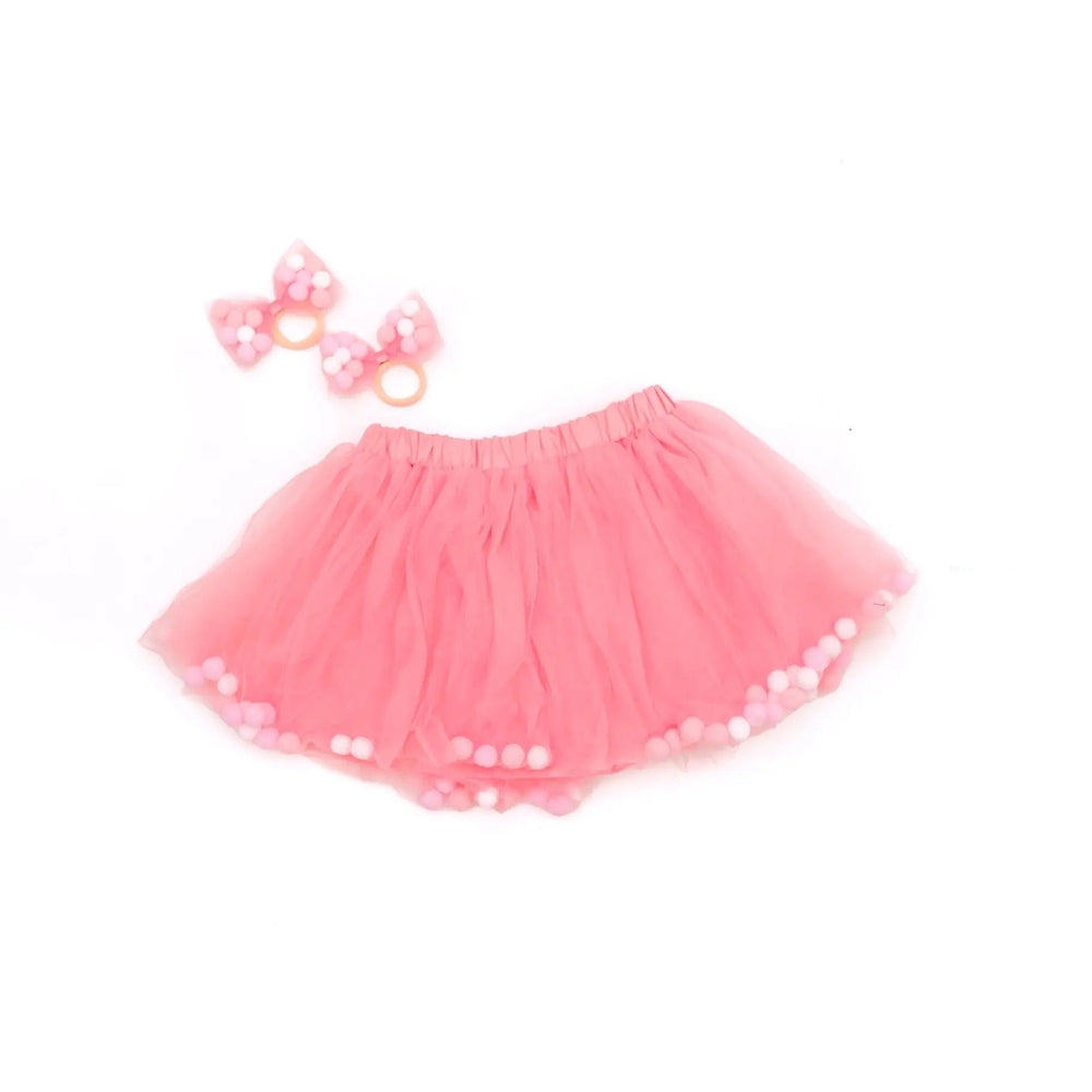 Tutu Joli LLC 2Pc Dust Rose Pom-Pom Tutu & Bow Hair Tie set; pink tulle tutu with white pom-pom trim beside two pink bows.