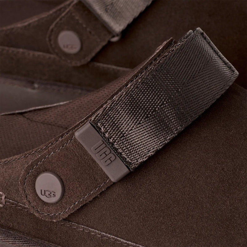 UGG Women's Goldenstar Clog Dusted Coca; brown suede clog with grey adjustable strap and logo hardware.