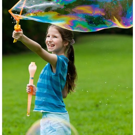 Uncle Bubble Giant Sword (Medium) bubble wand with 8 oz solution; girl blowing rainbow bubbles.