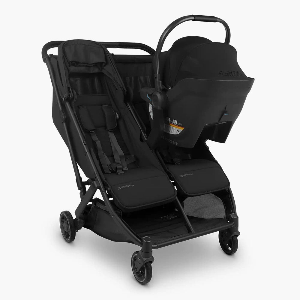 Uppababy Minu Duo adapters for Mesa and Aria on a black stroller with car seat attached