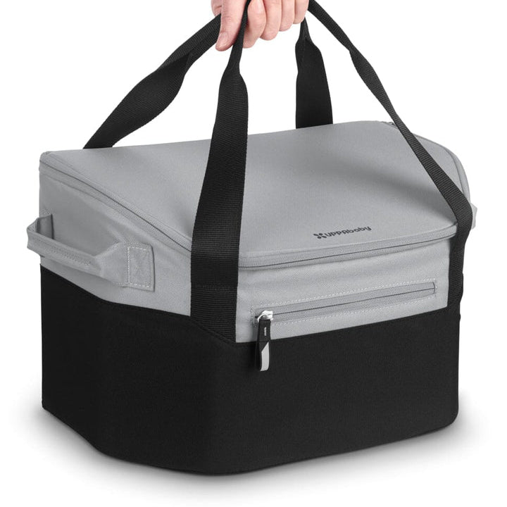 Uppababy Bevvy stroller basket cooler in grey top and black base with carrying handles.