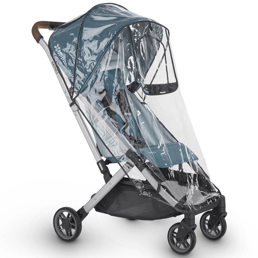 Uppababy Minu From Birth Kit Rain Shield on teal stroller, clear waterproof rain cover secured over the seat.