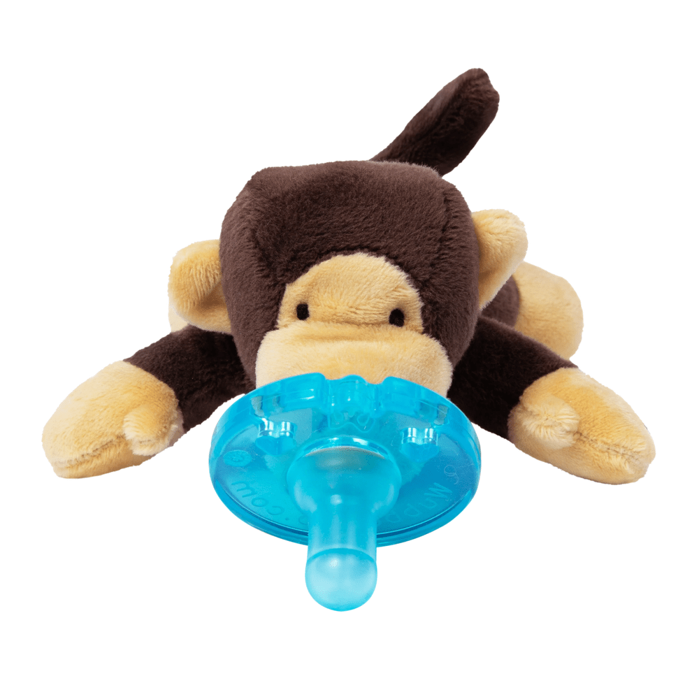 Aurora WubbaNub Infant Plush Toy Pacifier Monkey with blue pacifier in its mouth.
