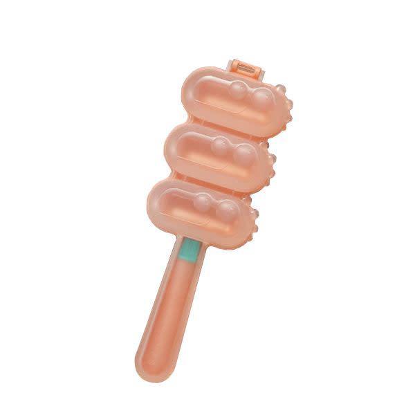 Rice ball maker, peach plastic with three rounded molds