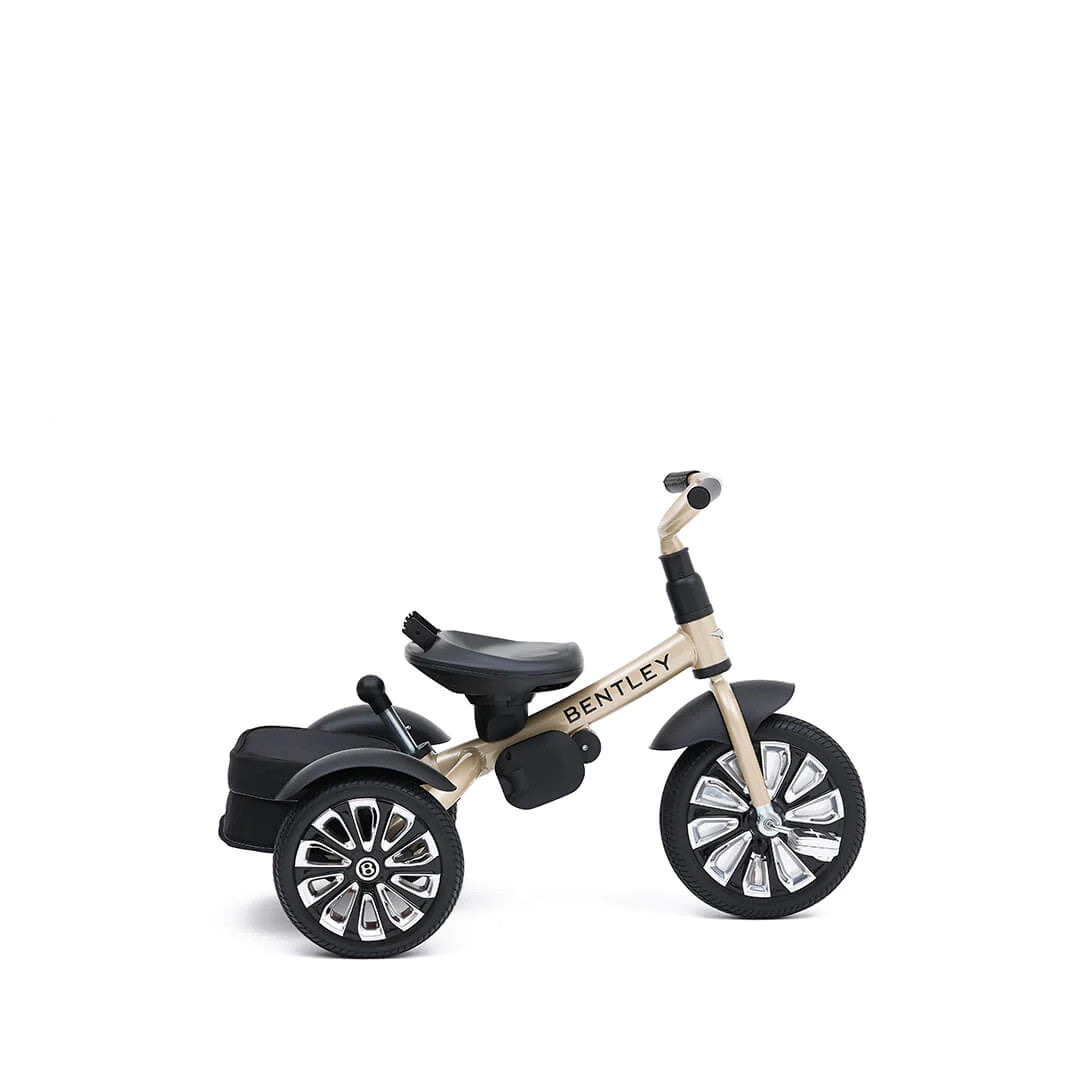 Bentley Trike 6-in-1 V2 Mulliner Gold beige tricycle with black seat and chrome wheels