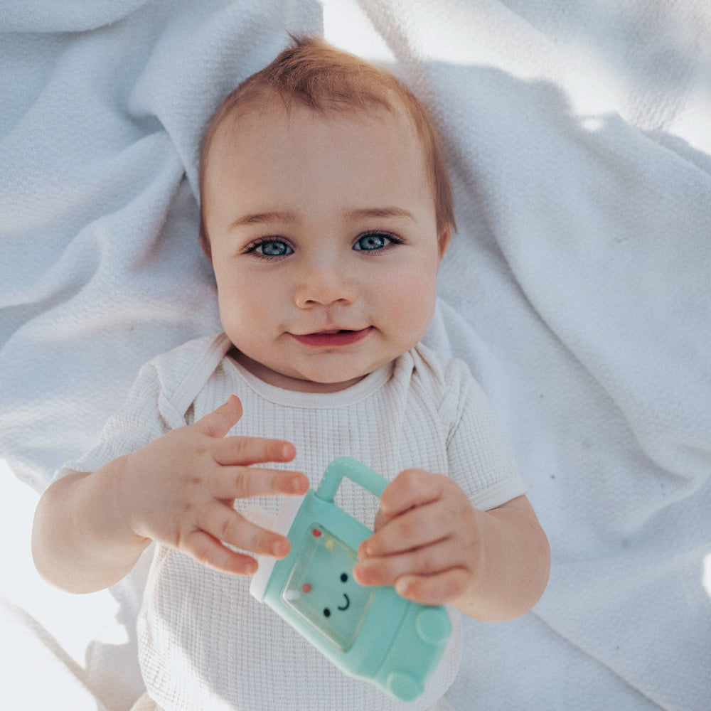Itzy Ritzy Sweetie Shake Plus rattle and teether, teal