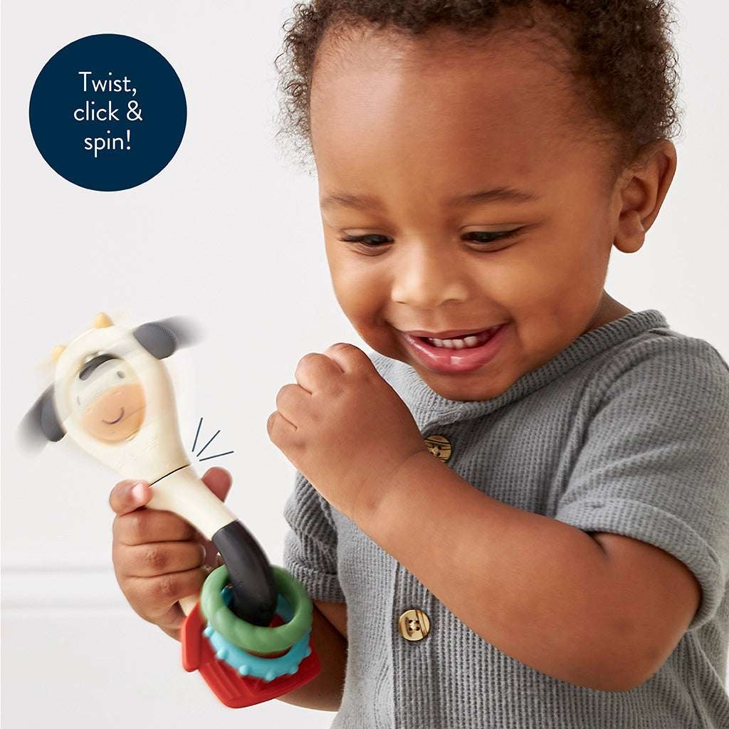 Itzy Ritzy Itzy Spinner toy with red base and stacked rings