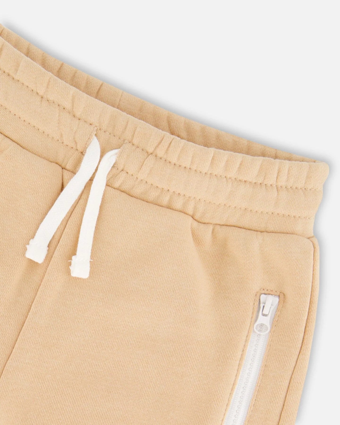 DEUXPARDEUX FRENCH TERRY SHORT WITH ZIPPER POCKETS BEIGE - baby enRoute