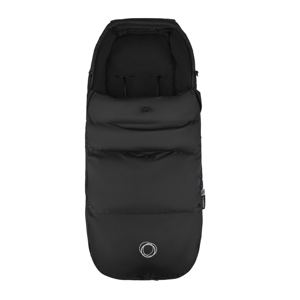 BUGABOO THERMOLITE® Performance Footmuff in black keeps a baby warm in a stroller during winter strolls.