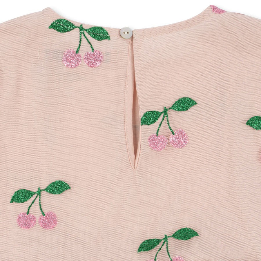 Konges Slojd Tullie Dress Pink Glitter; soft pink fabric features glitter cherries and a back button keyhole.