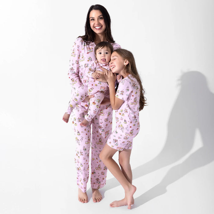 Bellabu Bear Bamboo Women's Pajama Set Tea Party worn by a smiling mother and two kids in matching pink floral pajamas.