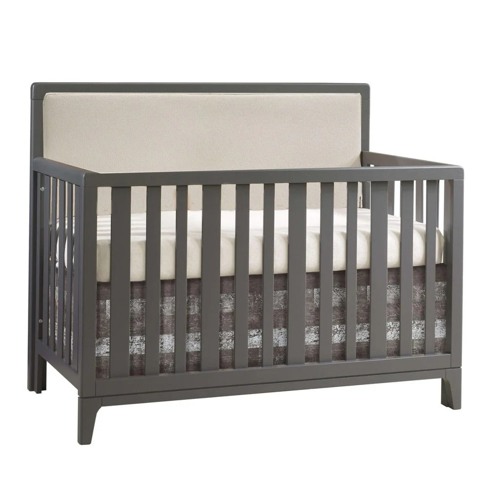 Natart Kyoto 5 In 1 Convertible Crib With Upholstered Panel Leather in gray with soft beige panel, perfect for a modern nursery.