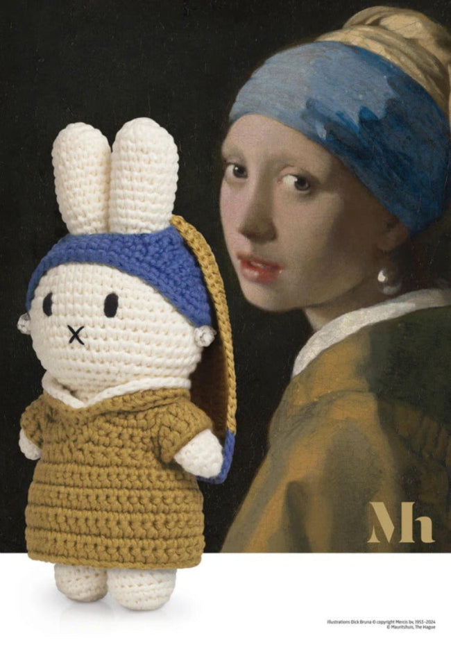 Just Dutch Miffy plush wearing a tan dress and blue headband, posed beside a Pearl Earring-inspired artwork.