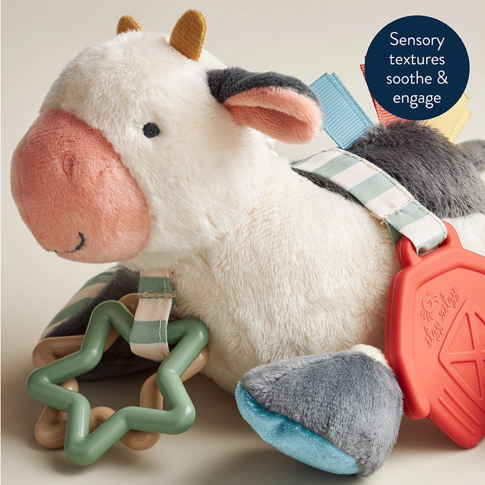 Itzy Ritzy Itzy Friends Link & Love activity plush cow, white with pink snout