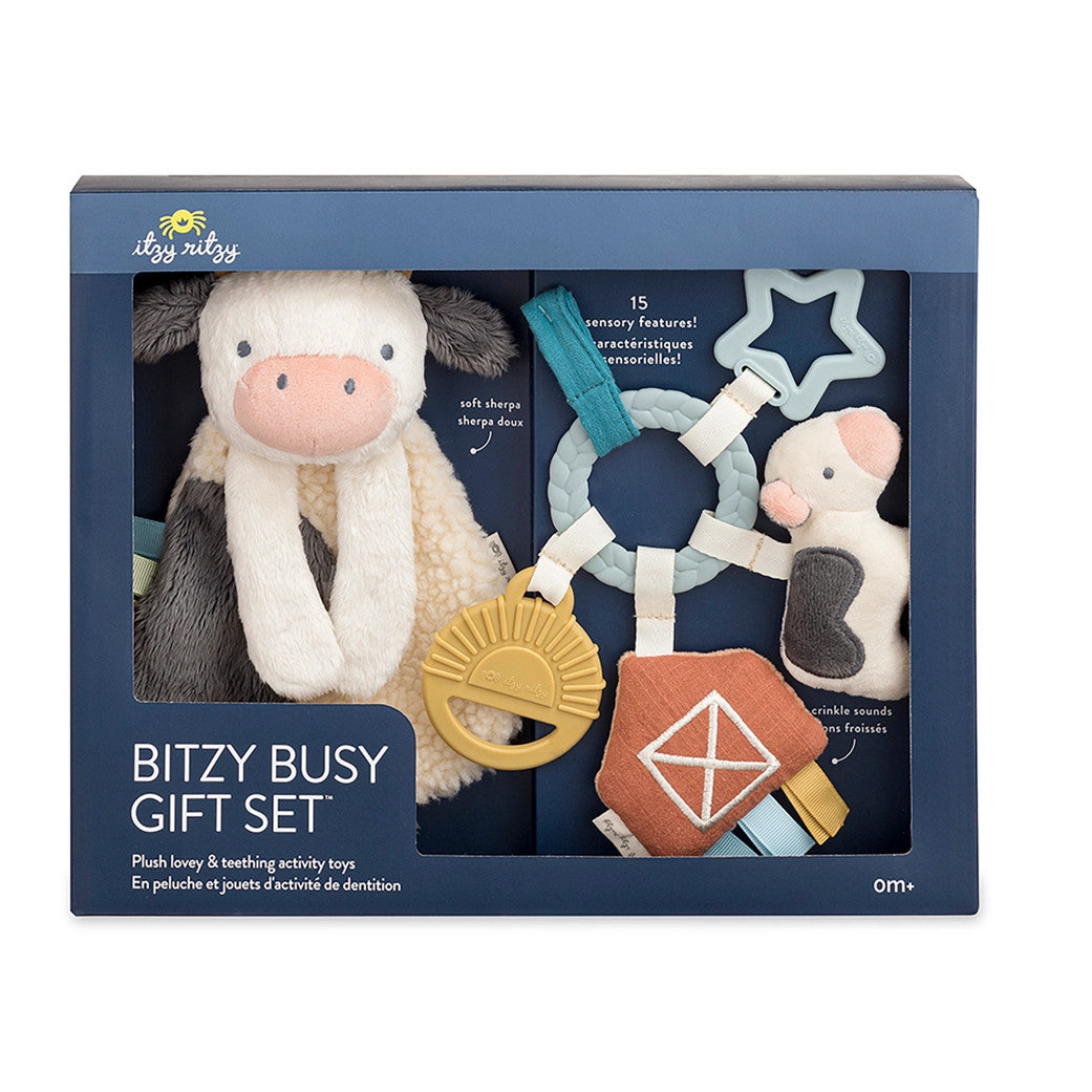 Itzy Ritzy Bitzy Busy Gift Set with plush cream cow lovey and blue teether toys