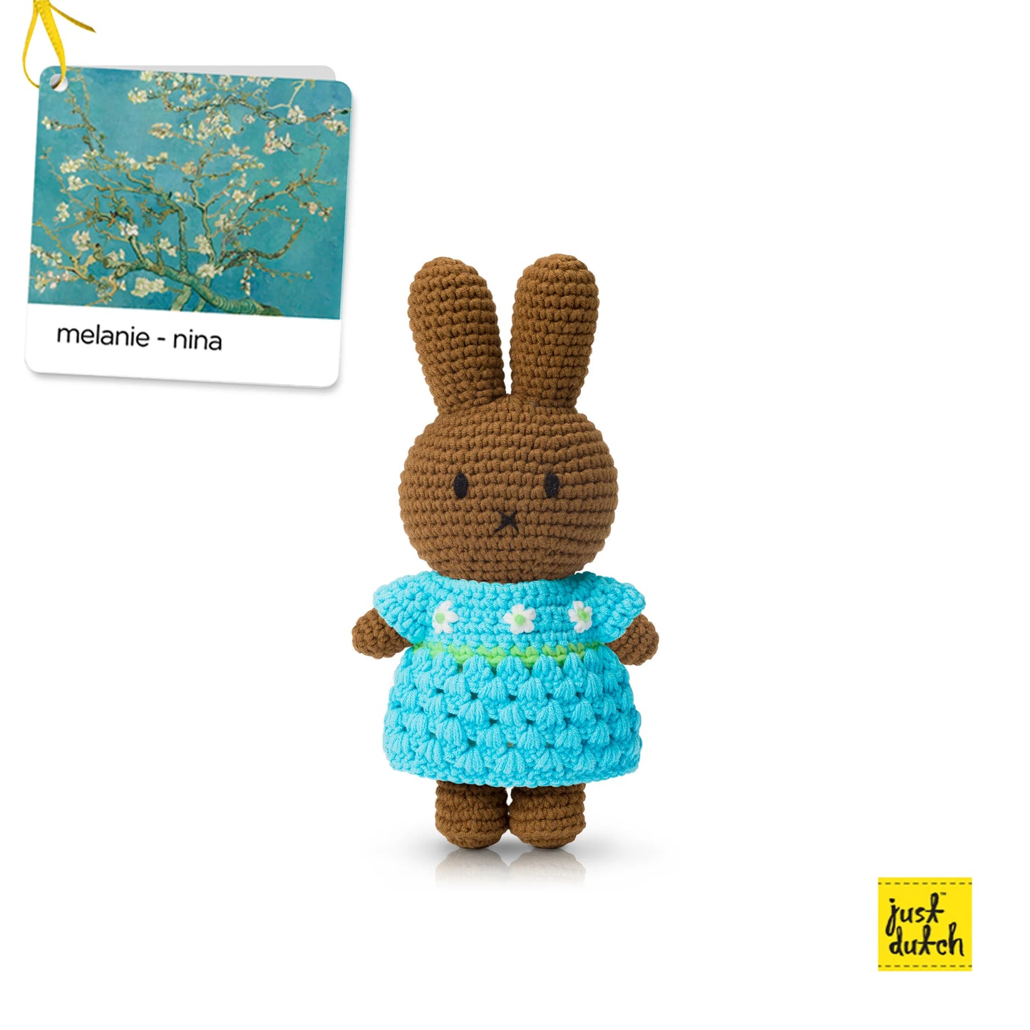 amigurumi bunny in blue dress with white flowers