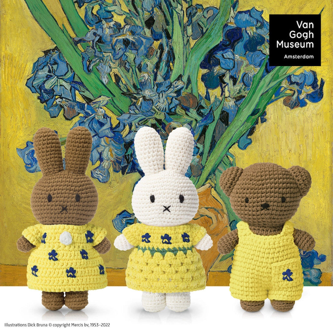 amigurumi Miffy rabbits; three figures in yellow dresses with blue flowers