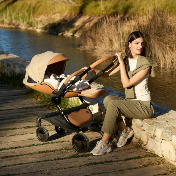 Mima Creo newborn snuggle stroller with beige tan leather accents