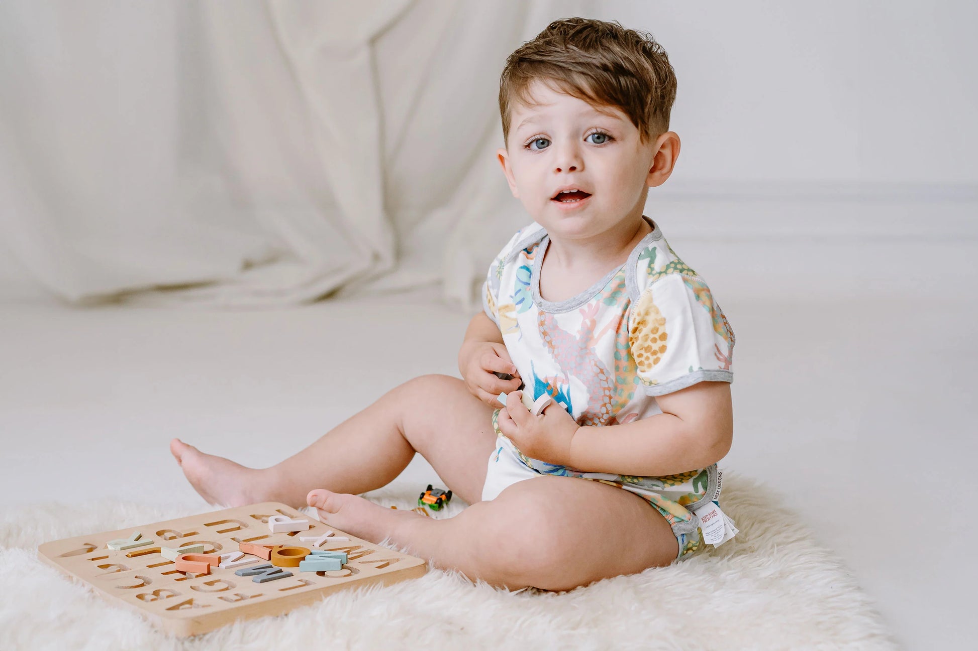 NEST DESIGNS BAMBOO SHORT SLEEVE ONESIE DRAGON DANCE