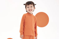 NEST DESIGNS TANBOOCEL MOCK NECK LONG SLEEVE SHIRT PANTONE APRICOT ORANGE