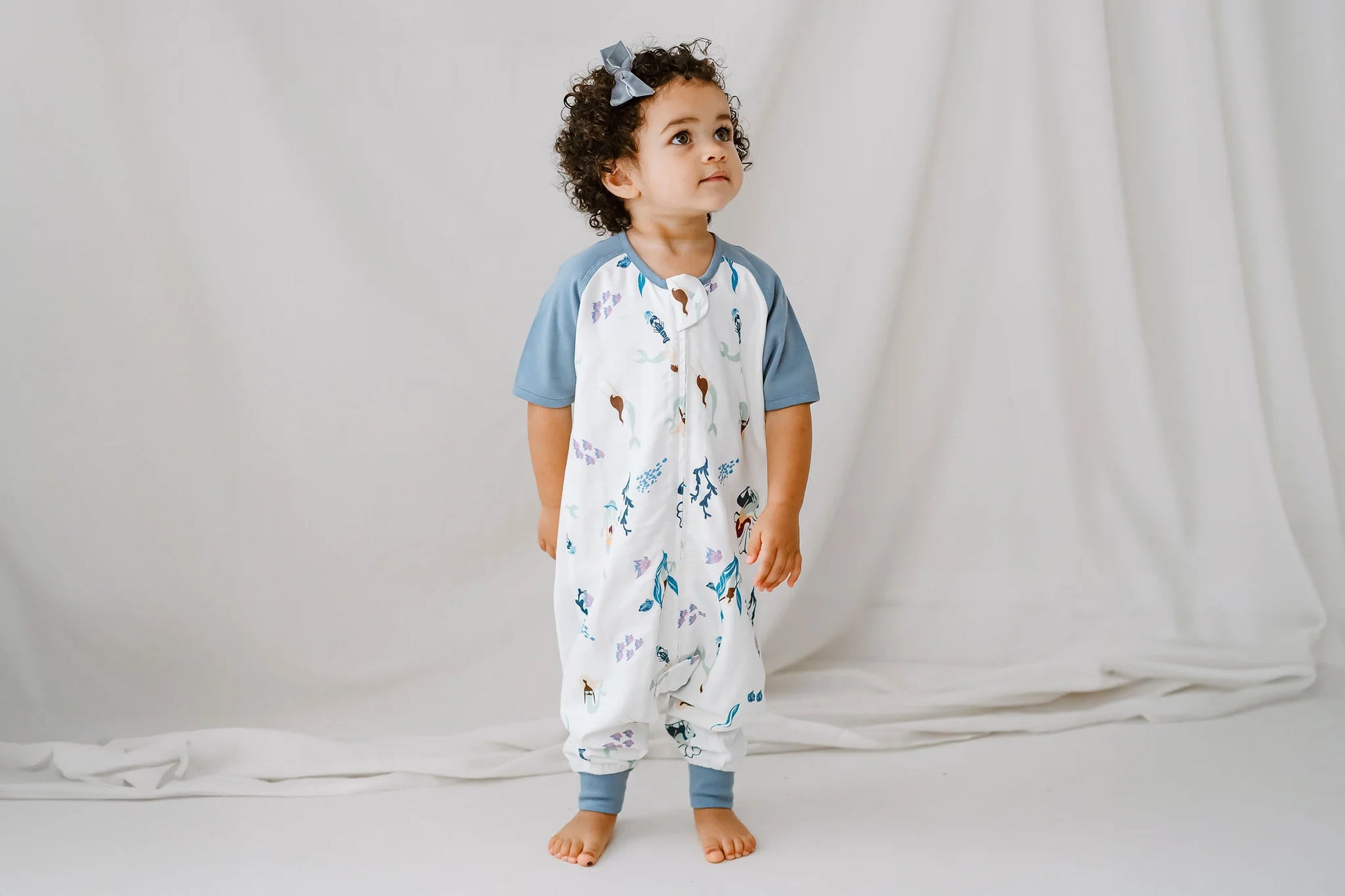 NEST DESIGNS RAGLAN BAMBOO PIMA SHORT SLEEVE FOOTED SLEEP BAG 0.6 TOG - SPLISH SPLASH
