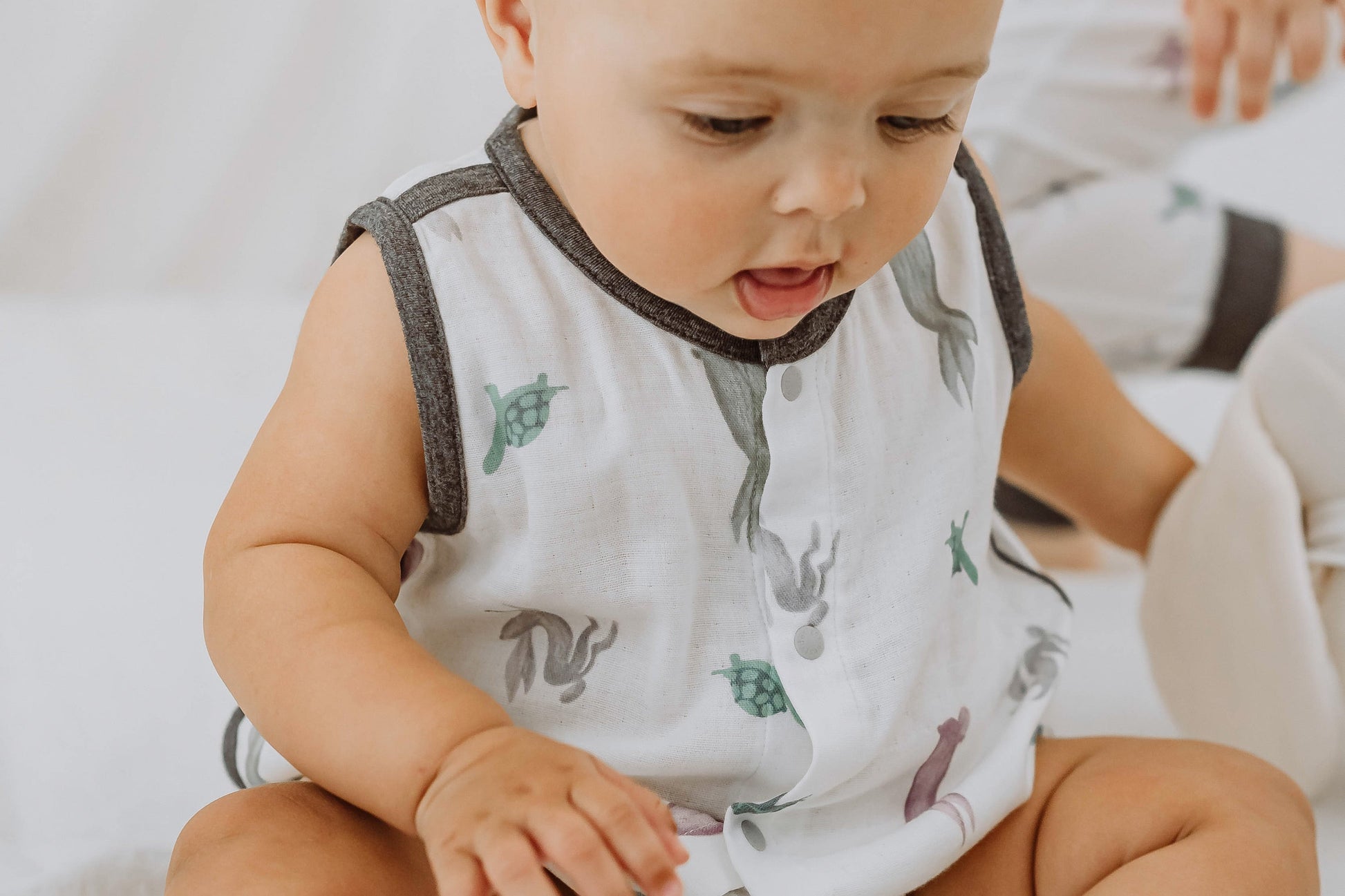 NEST DESIGNS BAMBOO PIMA SLEEVELESS BUTTON DOWN ONESIE - THE TORTOISE & THE HARE
