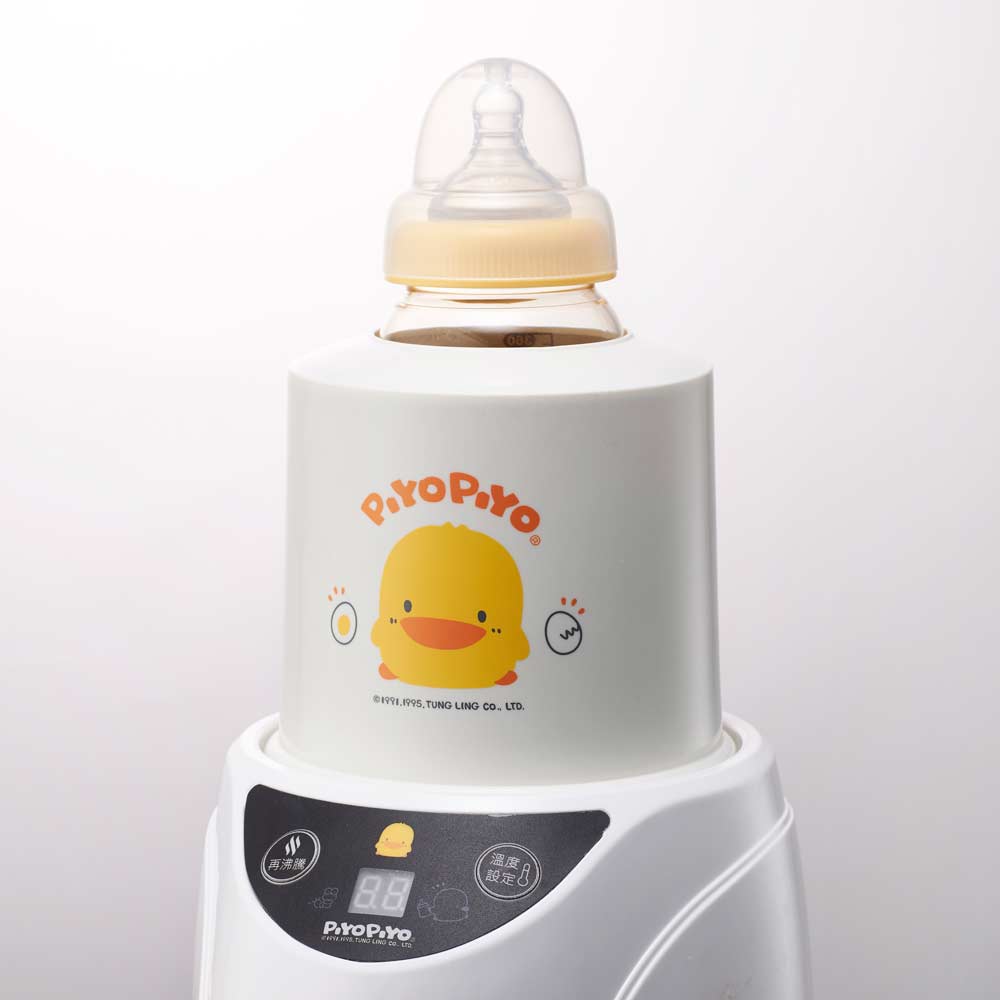 Piyopiyo milk and food warmer, white base with yellow chick logo