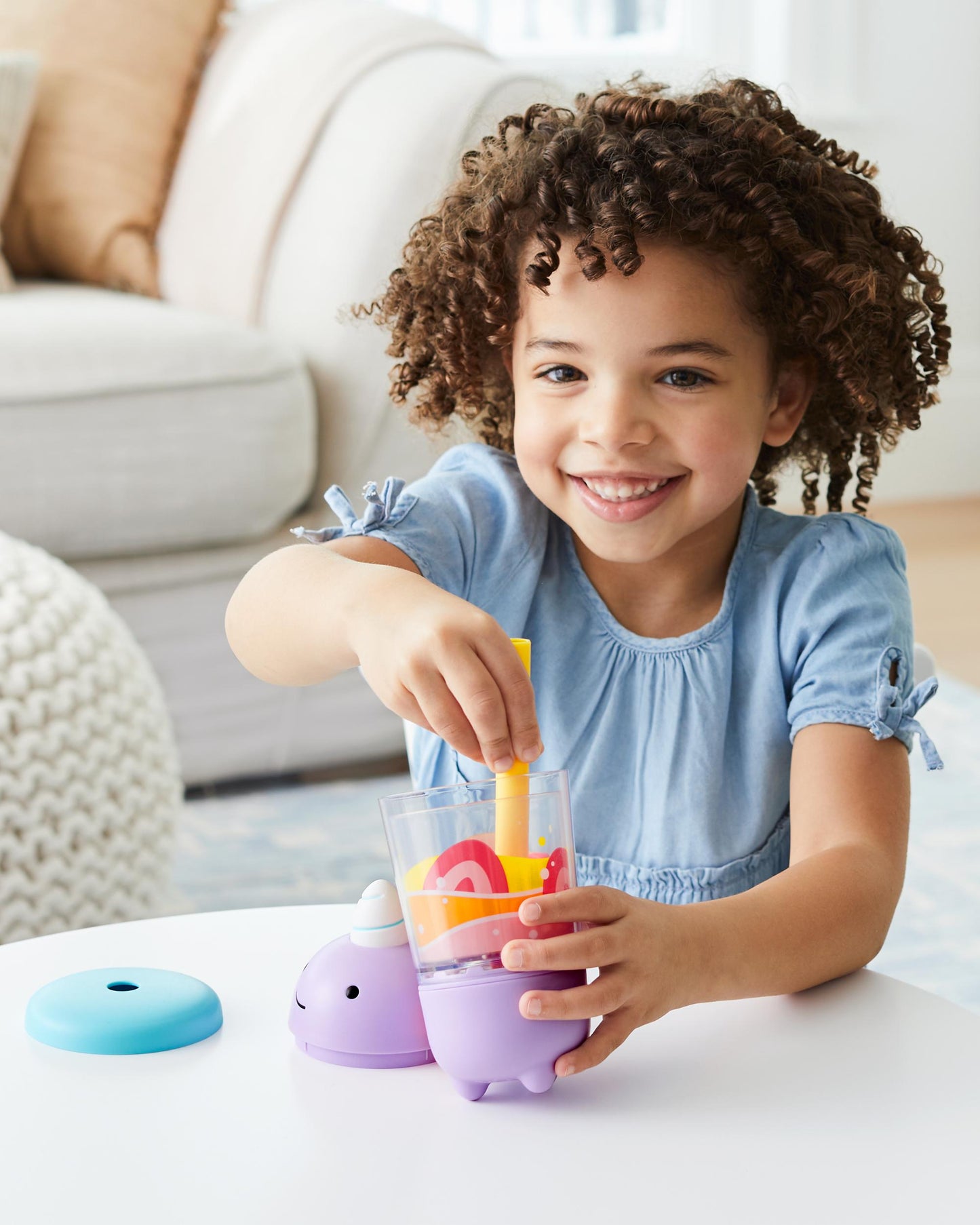 Skip Hop Zoo Shake It Up Smoothie Set purple blender base with colorful fruit shapes, child playing.
