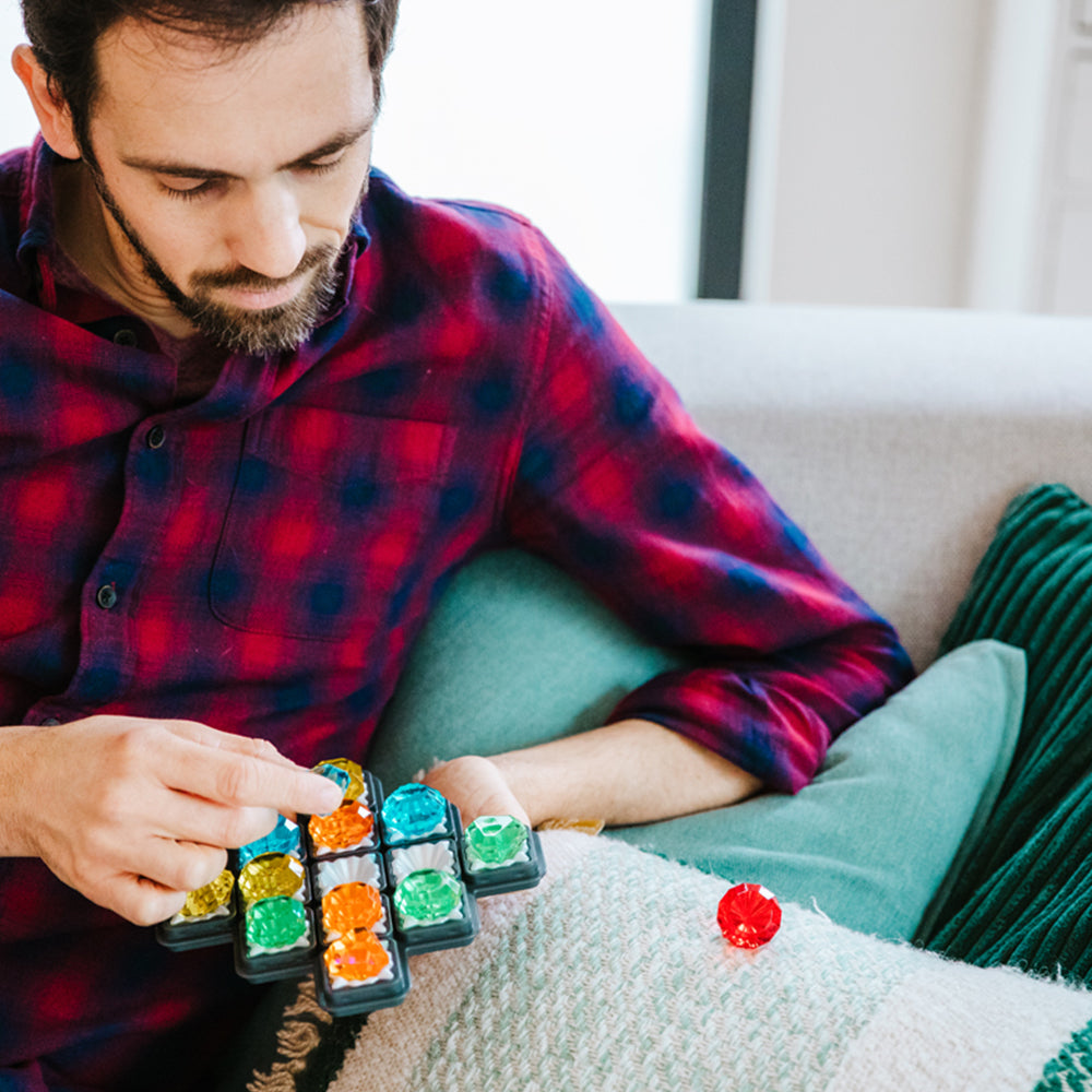 Smart Games Diamond Quest puzzle with colorful gem tiles