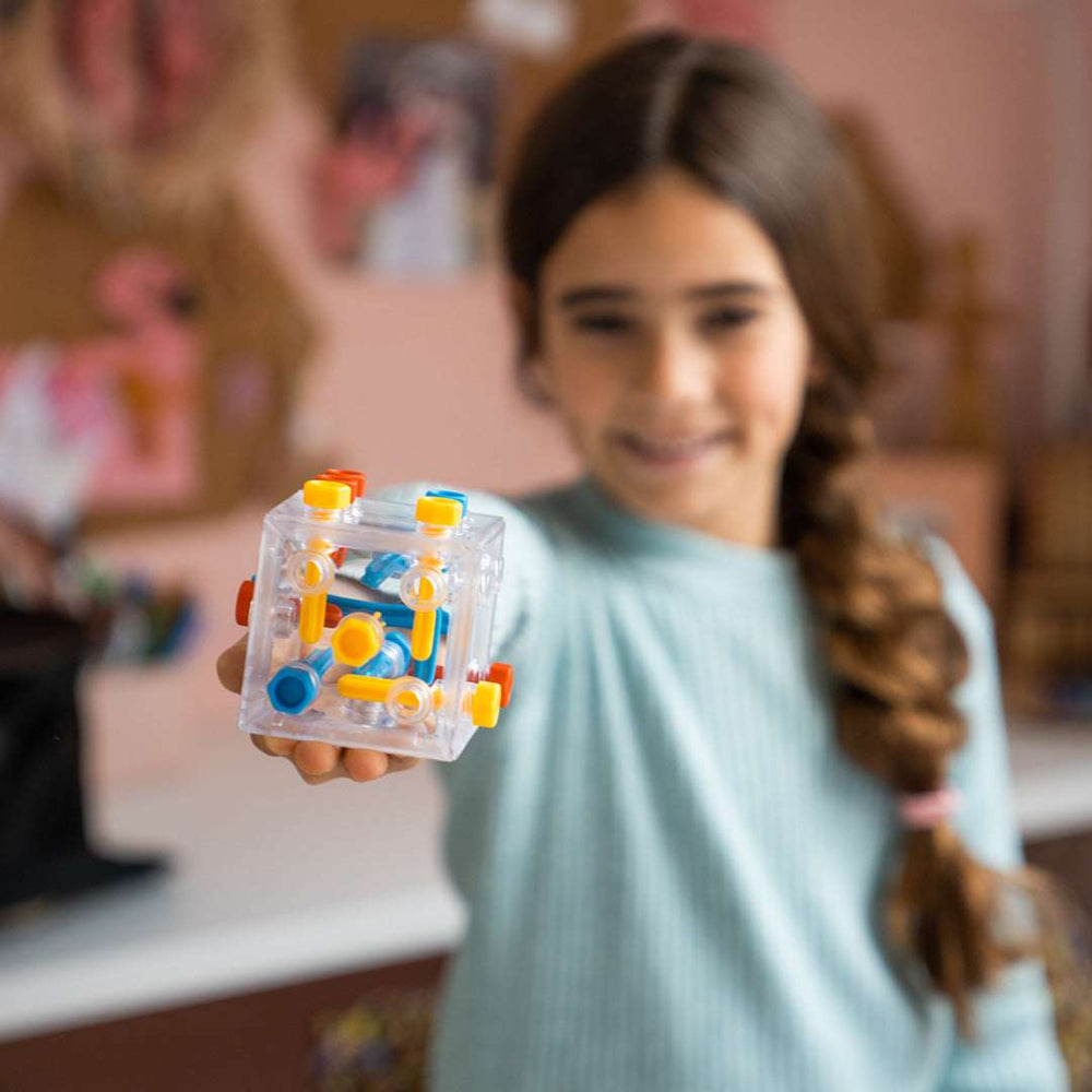 Smart Games Criss Cross Cube, transparent cube with colorful pegs